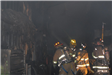 Fire Trainees Inside a Burnt up Building