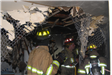 Fire Trainees Inside a Destroyed Building