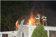 Crew of Trainees on the Roof of a Structure Fire